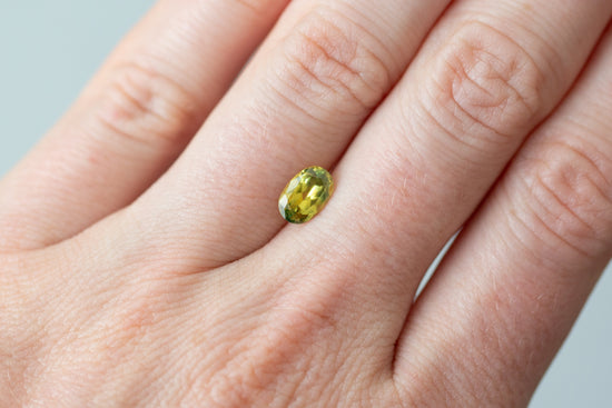 1.21ct Oval Yellow Orange Green Sapphire