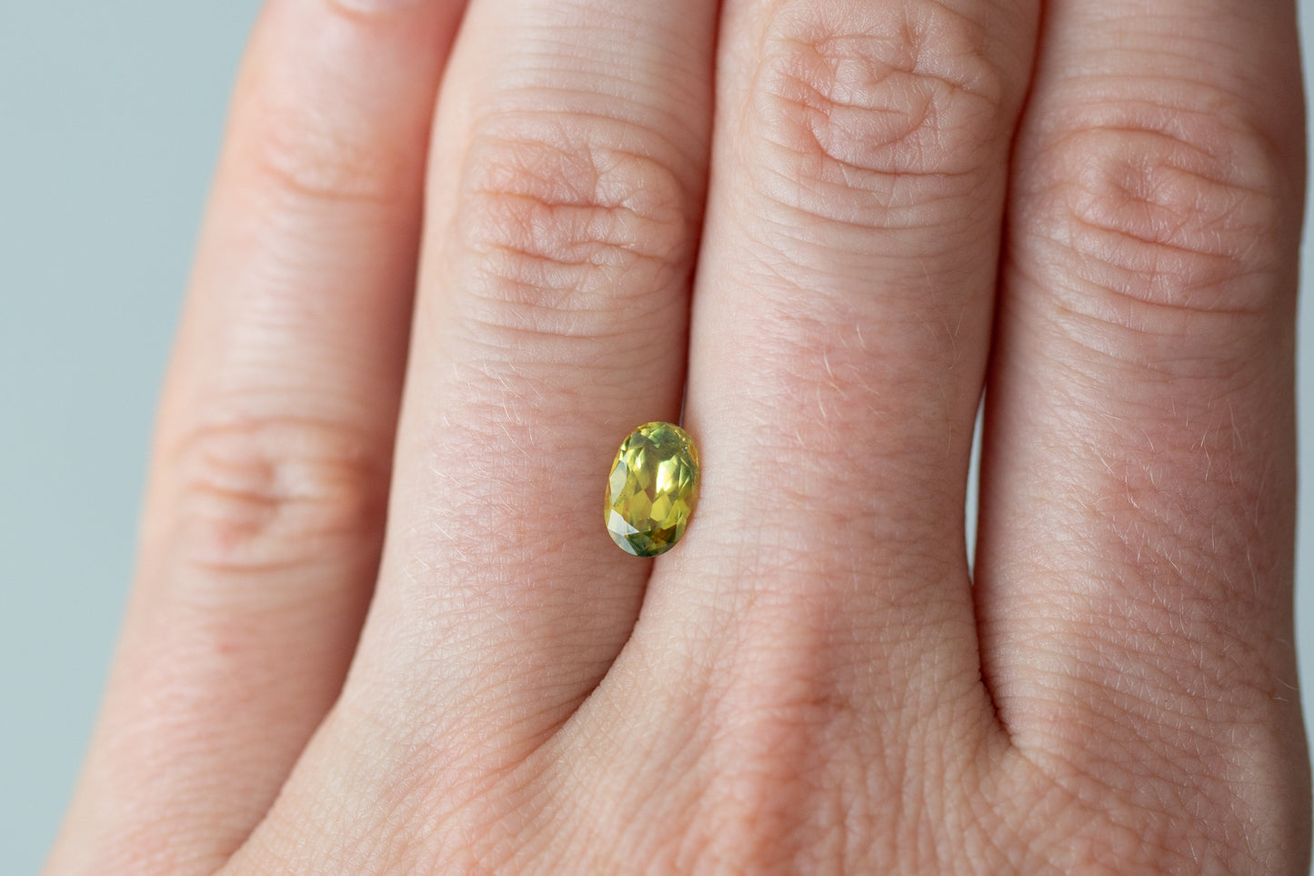 1.21ct Oval Yellow Orange Green Sapphire