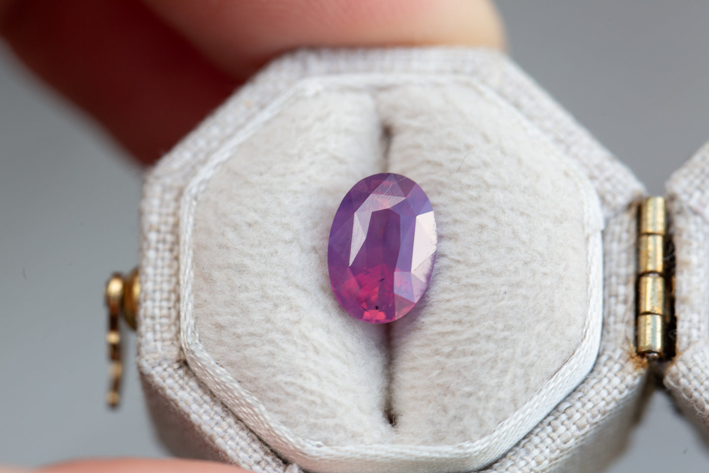2.5ct oval opalescent pink purple sapphire
