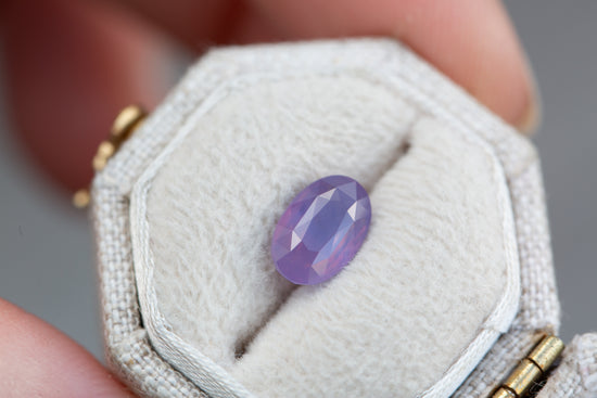 Load image into Gallery viewer, 1.55ct oval opalescent purple sapphire
