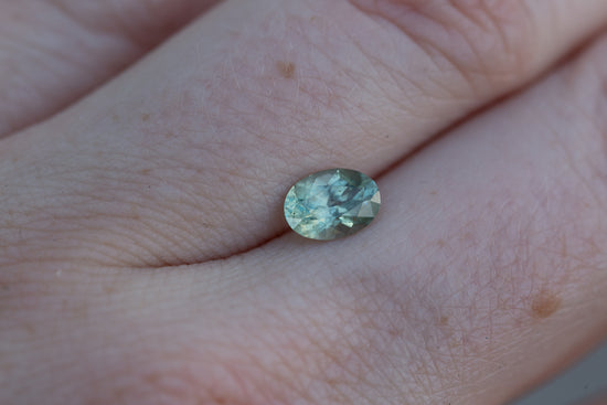 .97ct oval teal sapphire
