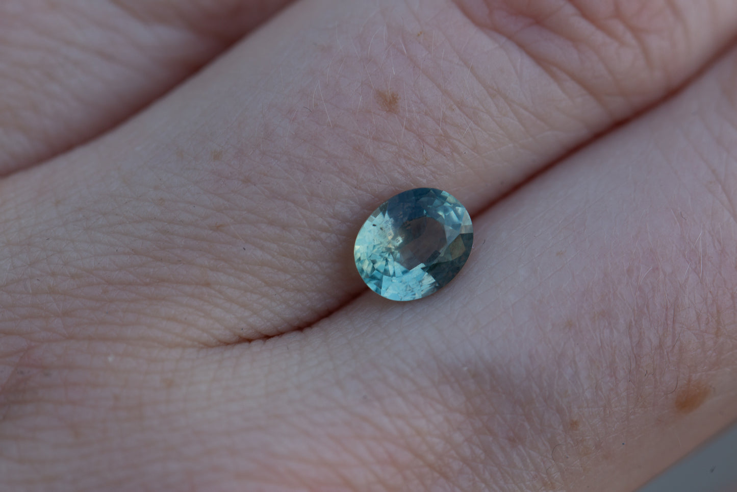 Load image into Gallery viewer, 1.45ct oval teal sapphire
