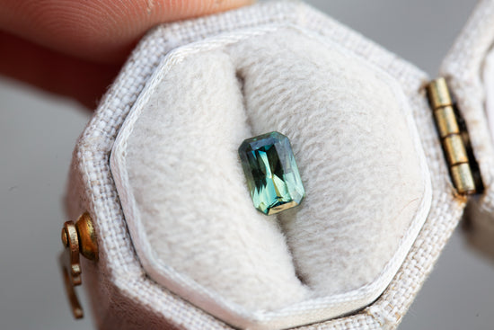 Load image into Gallery viewer, .82ct emerald cut green teal blue sapphire
