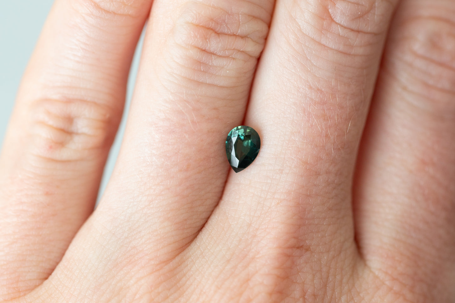 ON HOLD 0.73ct Pear Deep Green Sapphire