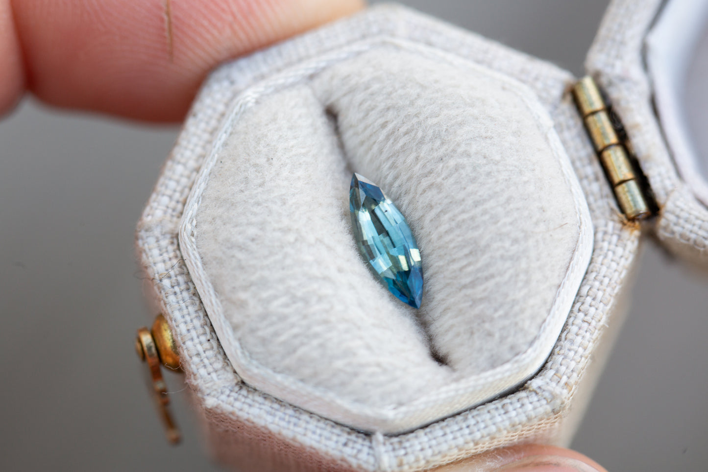 Load image into Gallery viewer, .62ct marquise teal blue sapphire
