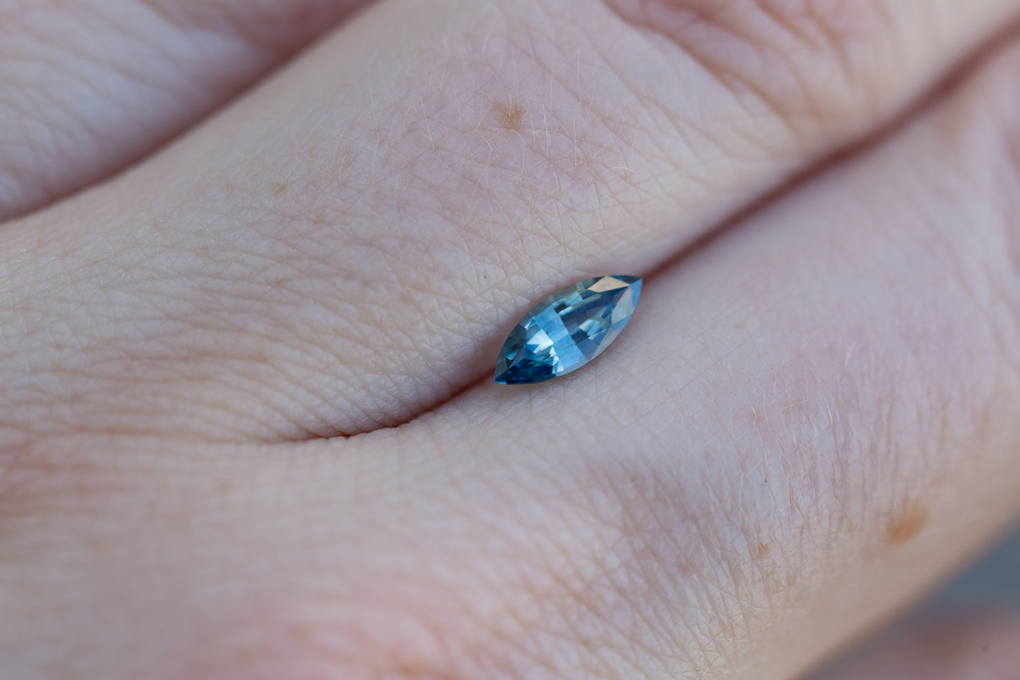Load image into Gallery viewer, .495ct marquise blue teal sapphire
