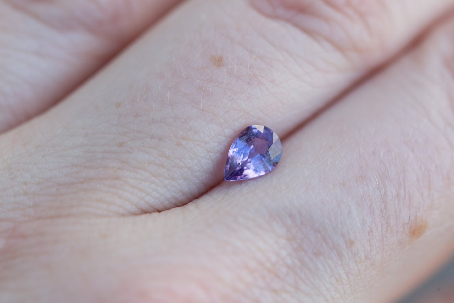 Load image into Gallery viewer, .7ct pear purple sapphire
