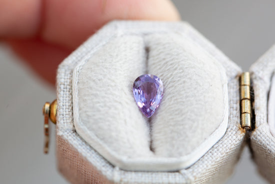 Load image into Gallery viewer, .75ct pear purple sapphire
