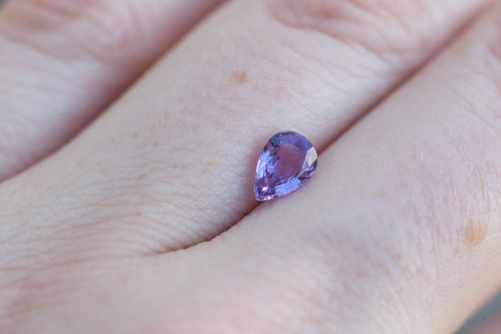 Load image into Gallery viewer, .75ct pear purple sapphire
