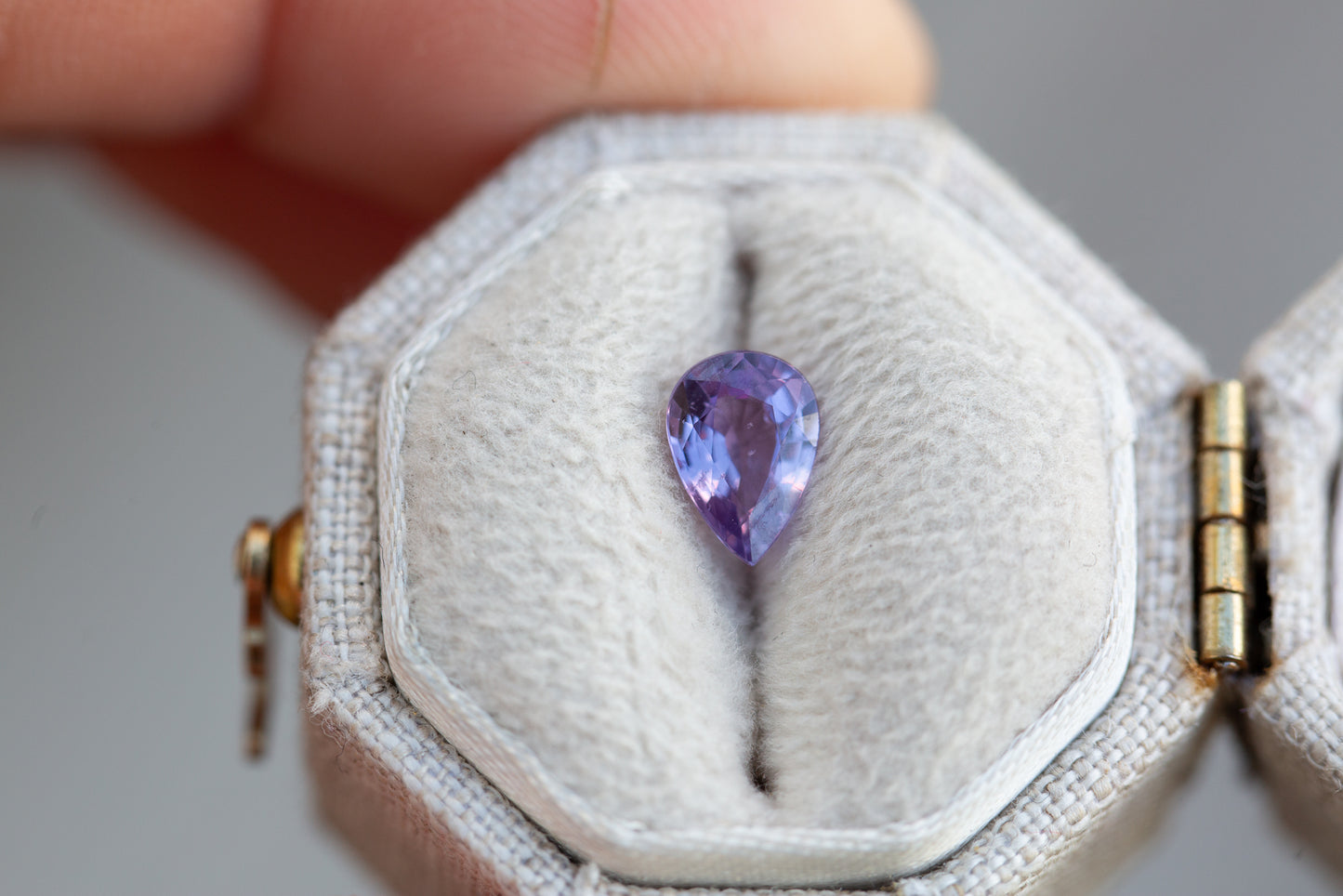 Load image into Gallery viewer, .83ct pear purple sapphire
