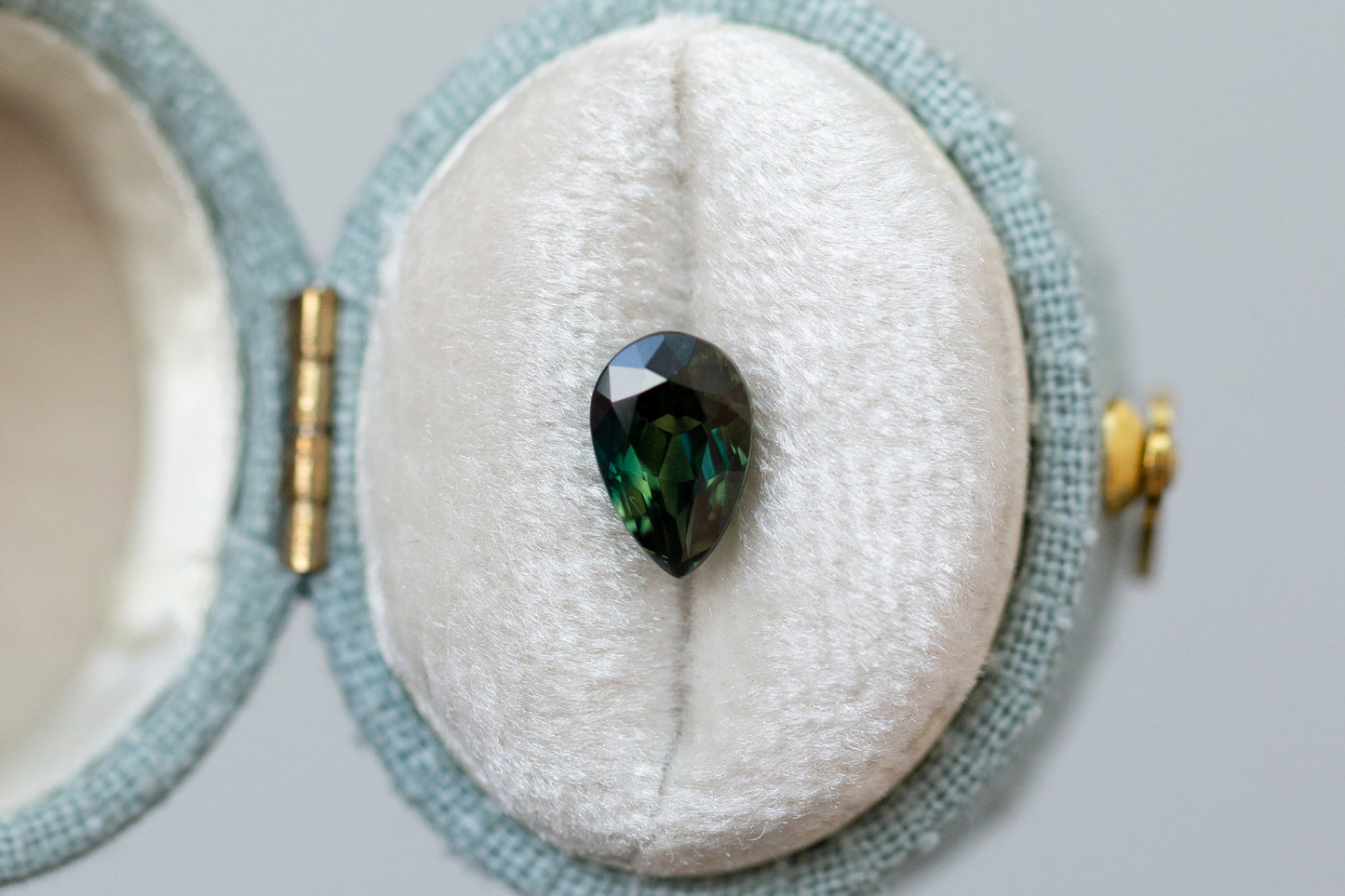 1.55ct Pear Deep Green Teal Sapphire