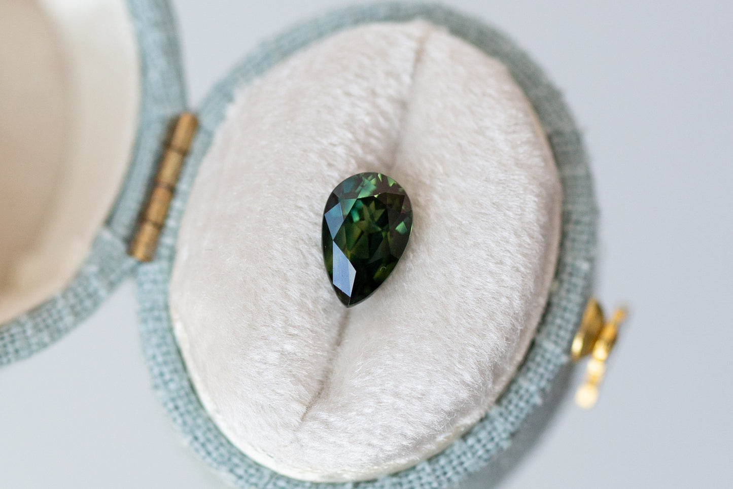 1.55ct Pear Deep Green Teal Sapphire