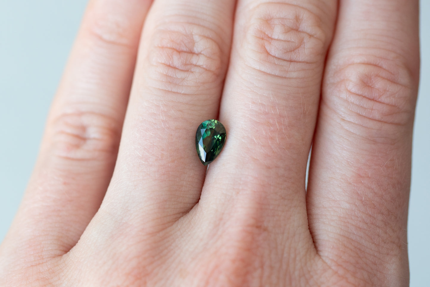 1.55ct Pear Deep Green Teal Sapphire