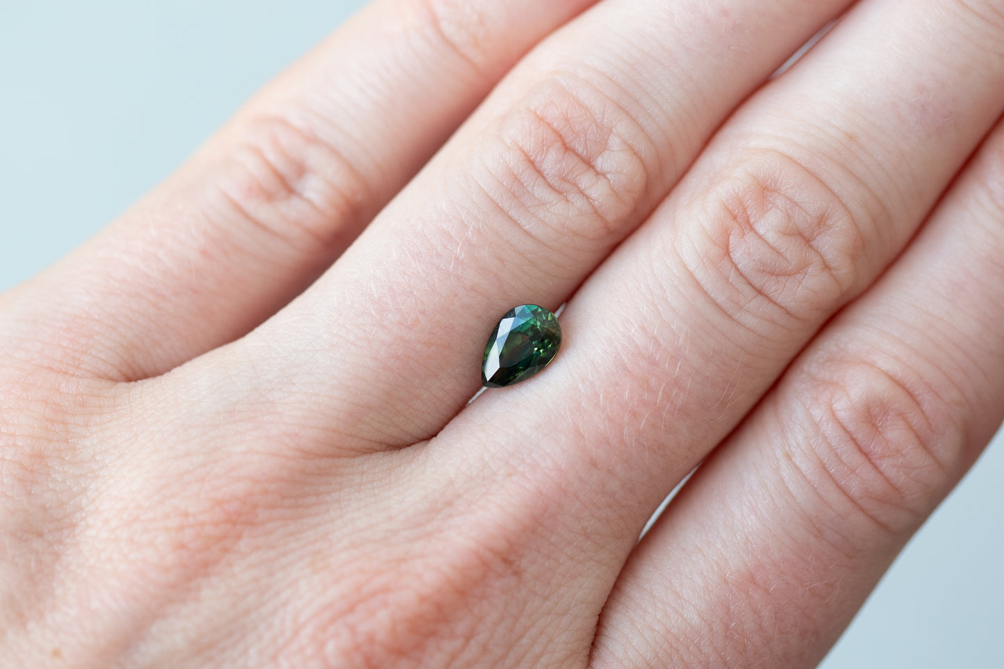 1.55ct Pear Deep Green Teal Sapphire