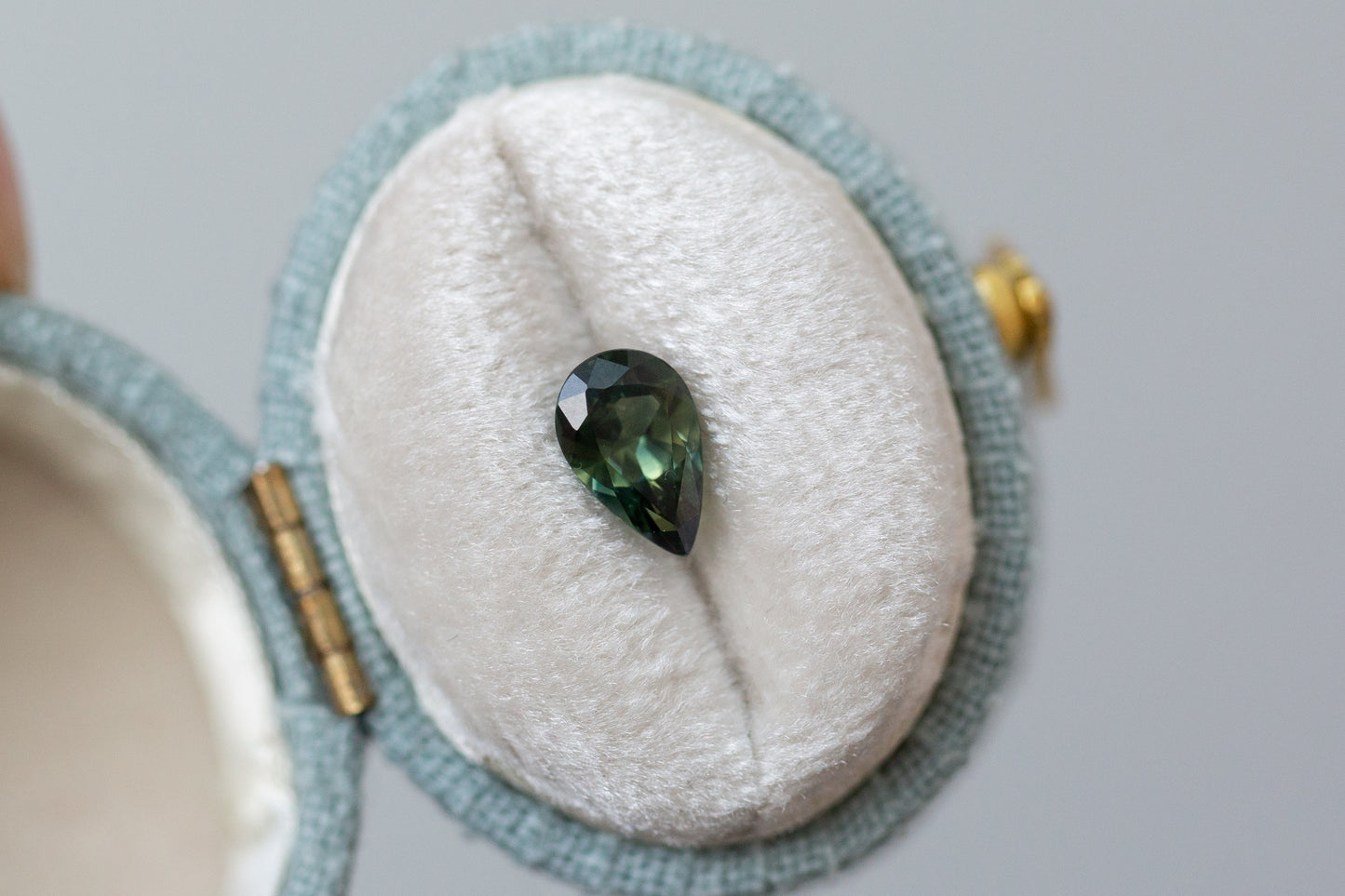 1.09ct Pear Darker Green Sapphire