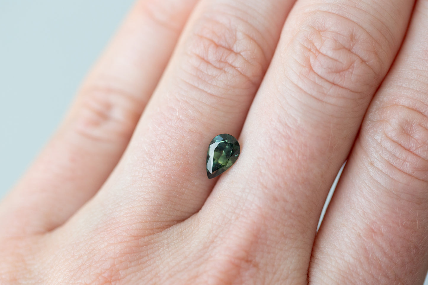 1.09ct Pear Darker Green Sapphire