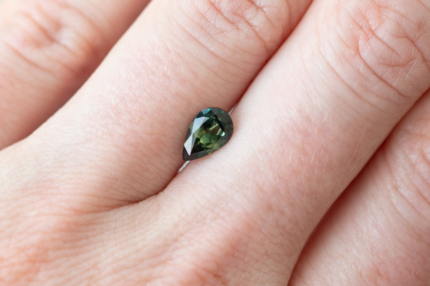 1.09ct Pear Darker Green Sapphire