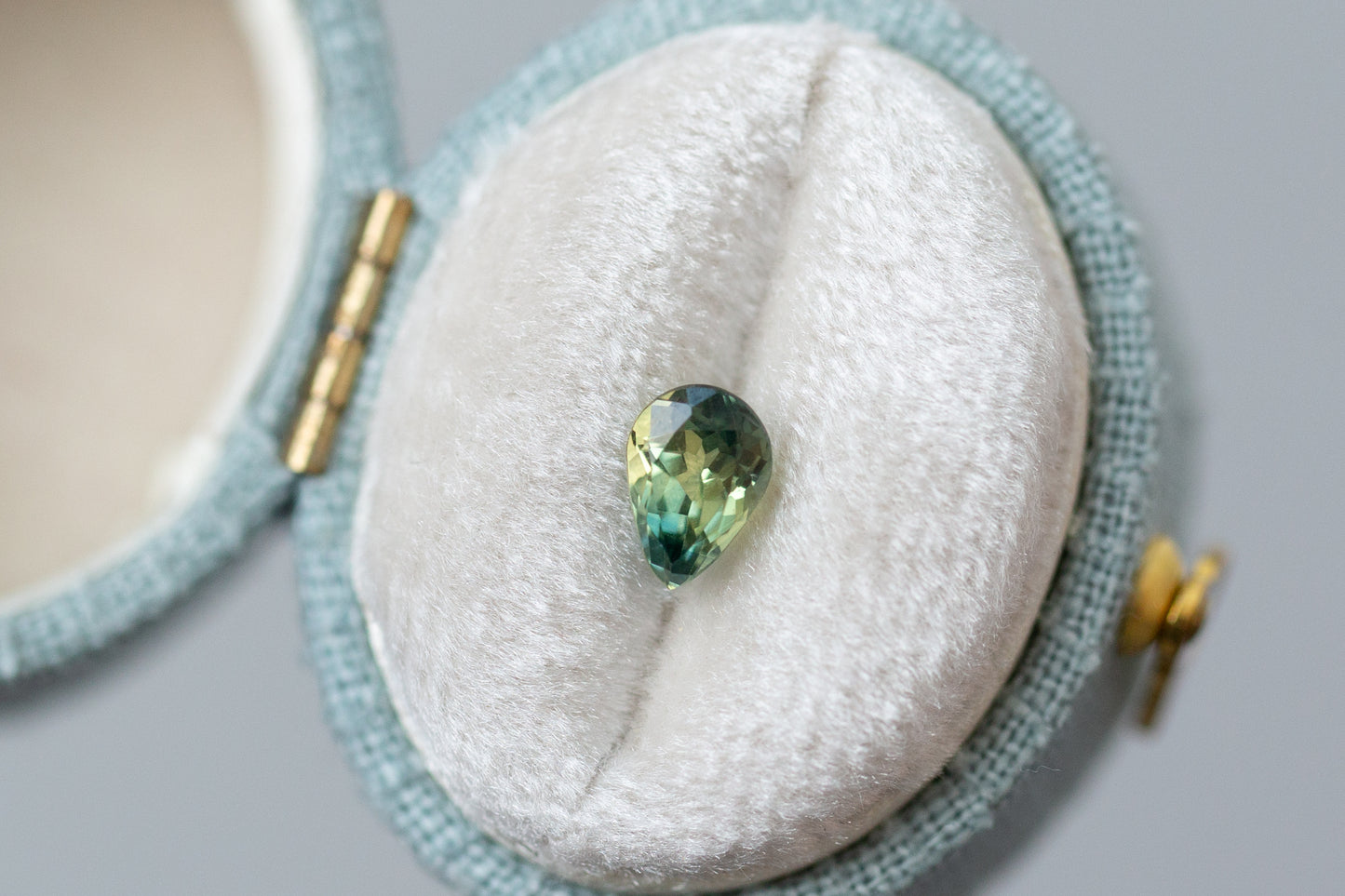 0.91ct Pear Green Yellow Teal Sapphire