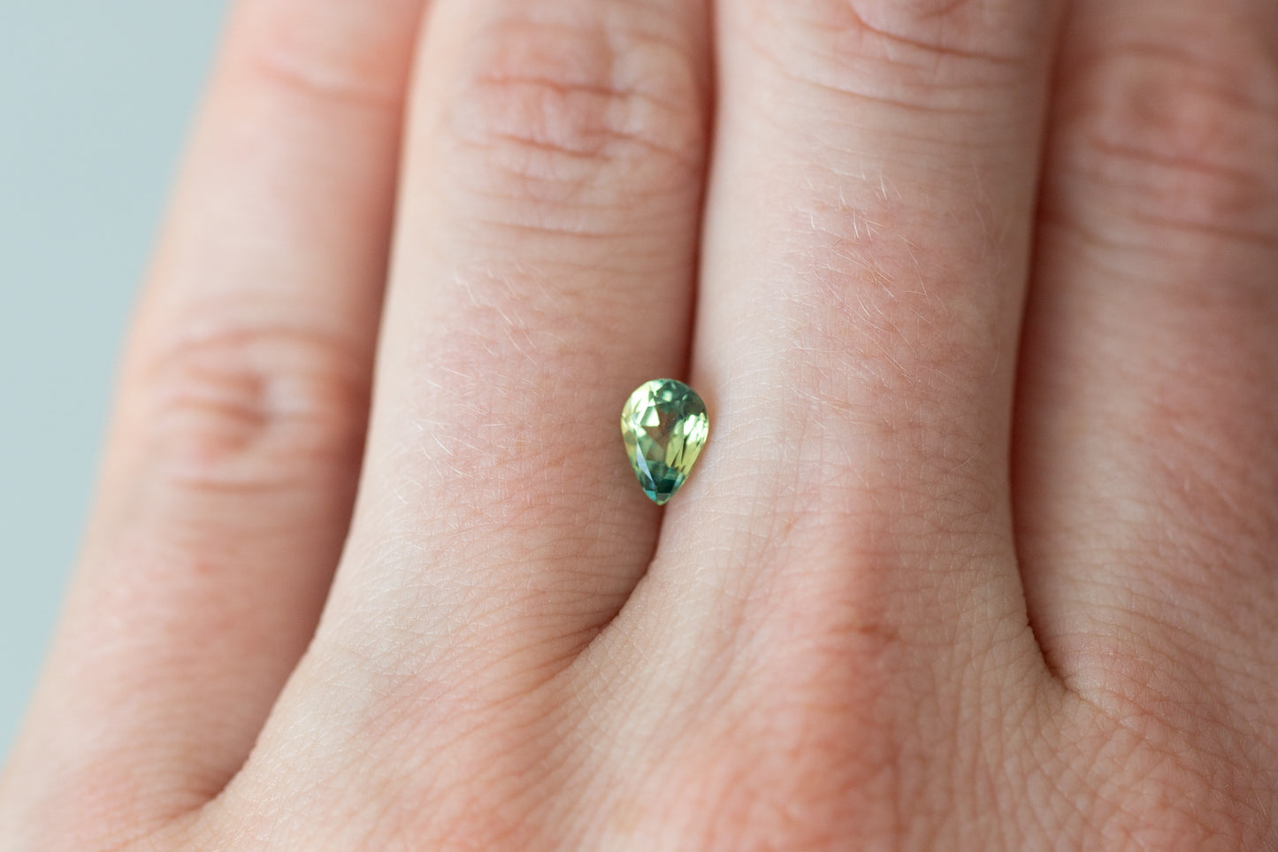 0.91ct Pear Green Yellow Teal Sapphire