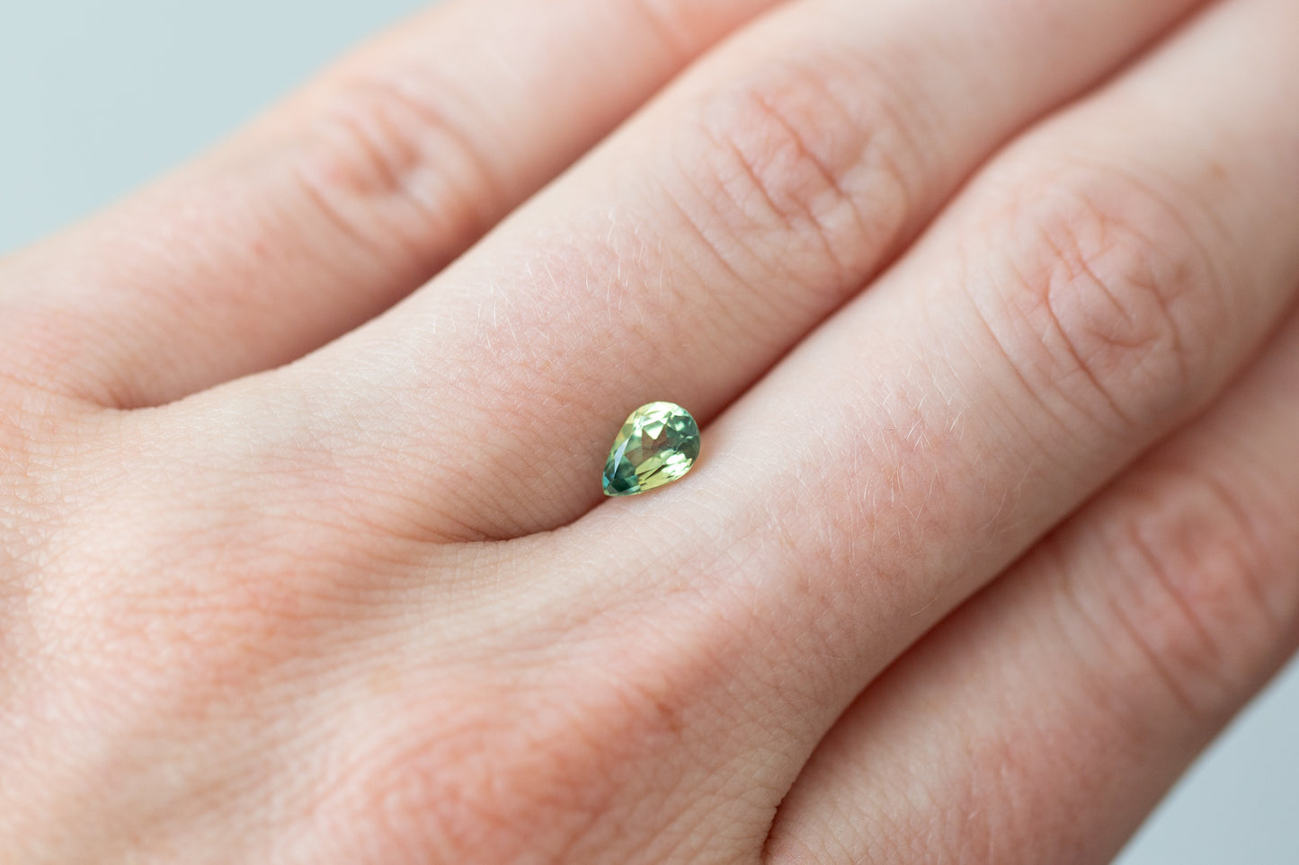 0.91ct Pear Green Yellow Teal Sapphire