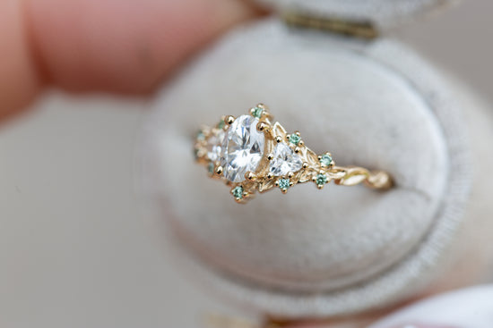 Briar rose three stone with moissanite and mint diamond accents