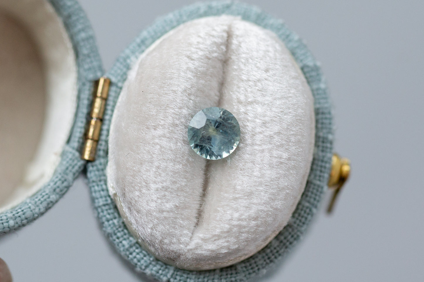 0.93ct Round Light Blue and Yellow Sapphire