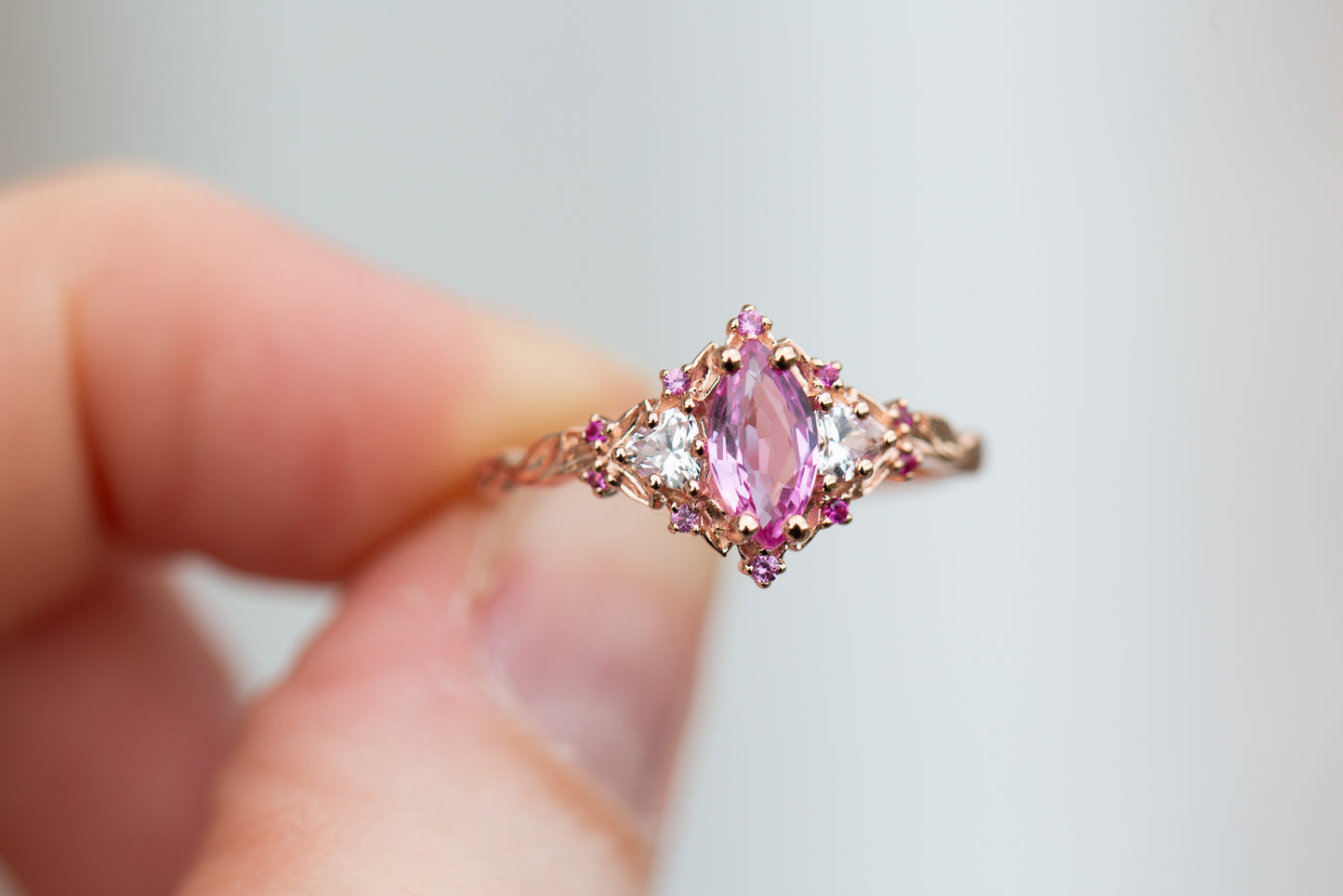 Briar rose three stone with marquise natural pink sapphire center