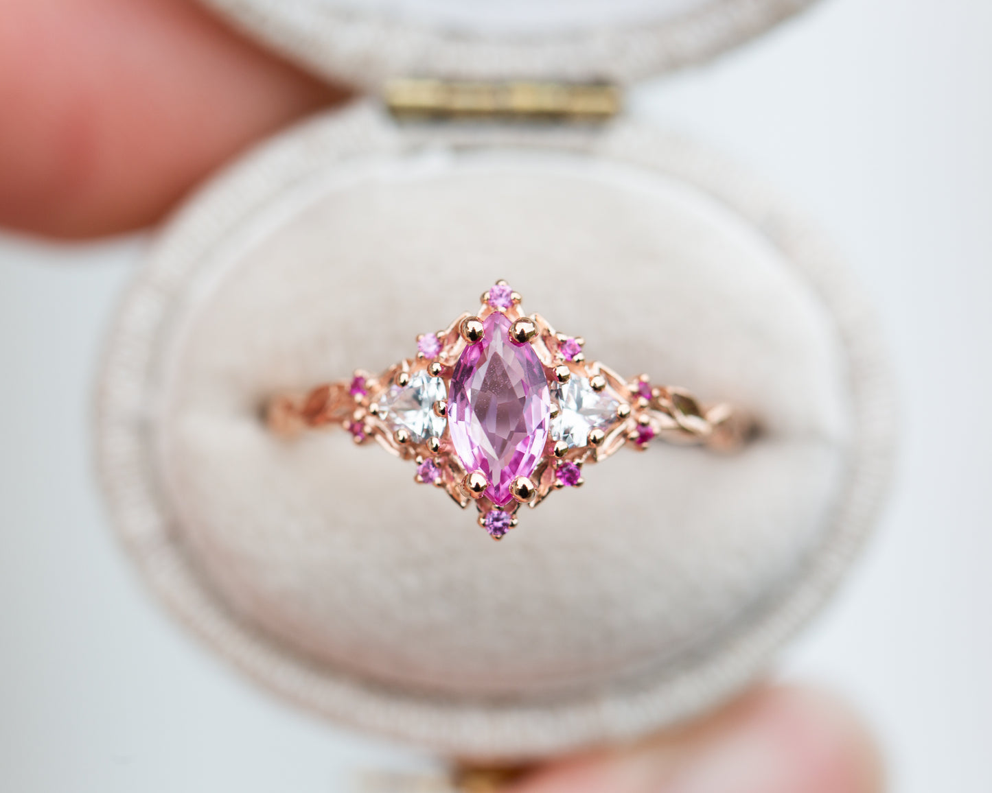 Briar rose three stone with marquise natural pink sapphire center