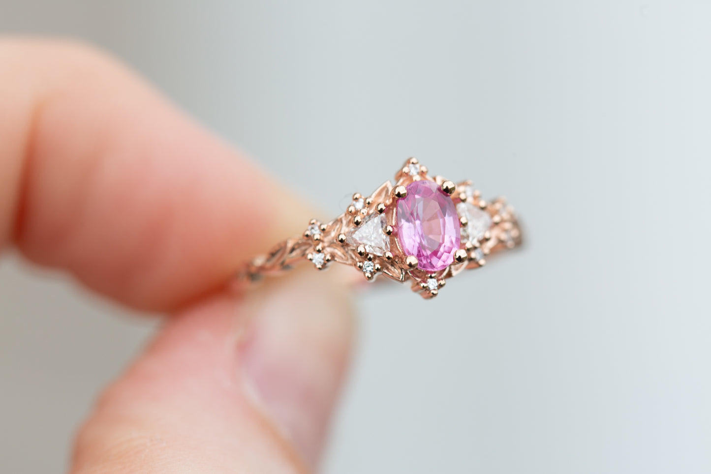 Briar rose three stone with grade A natural pink sapphire oval center