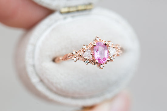 Briar rose three stone with grade A natural pink sapphire oval center