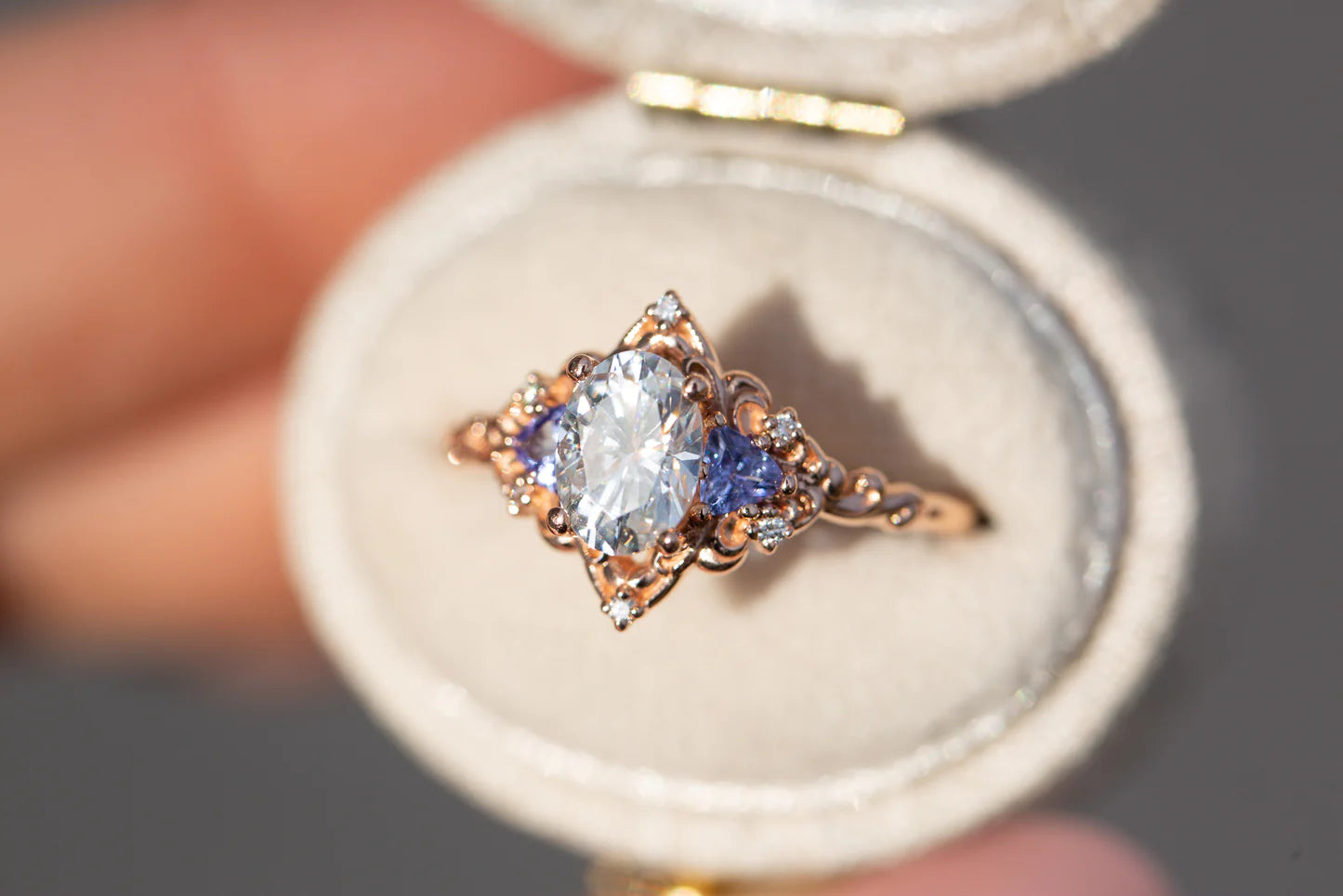 Customize your own Aurora Three Stone with 7x5mm oval center
