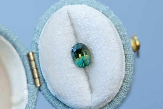 1.02ct Oval Yellowish Green Teal Sapphire