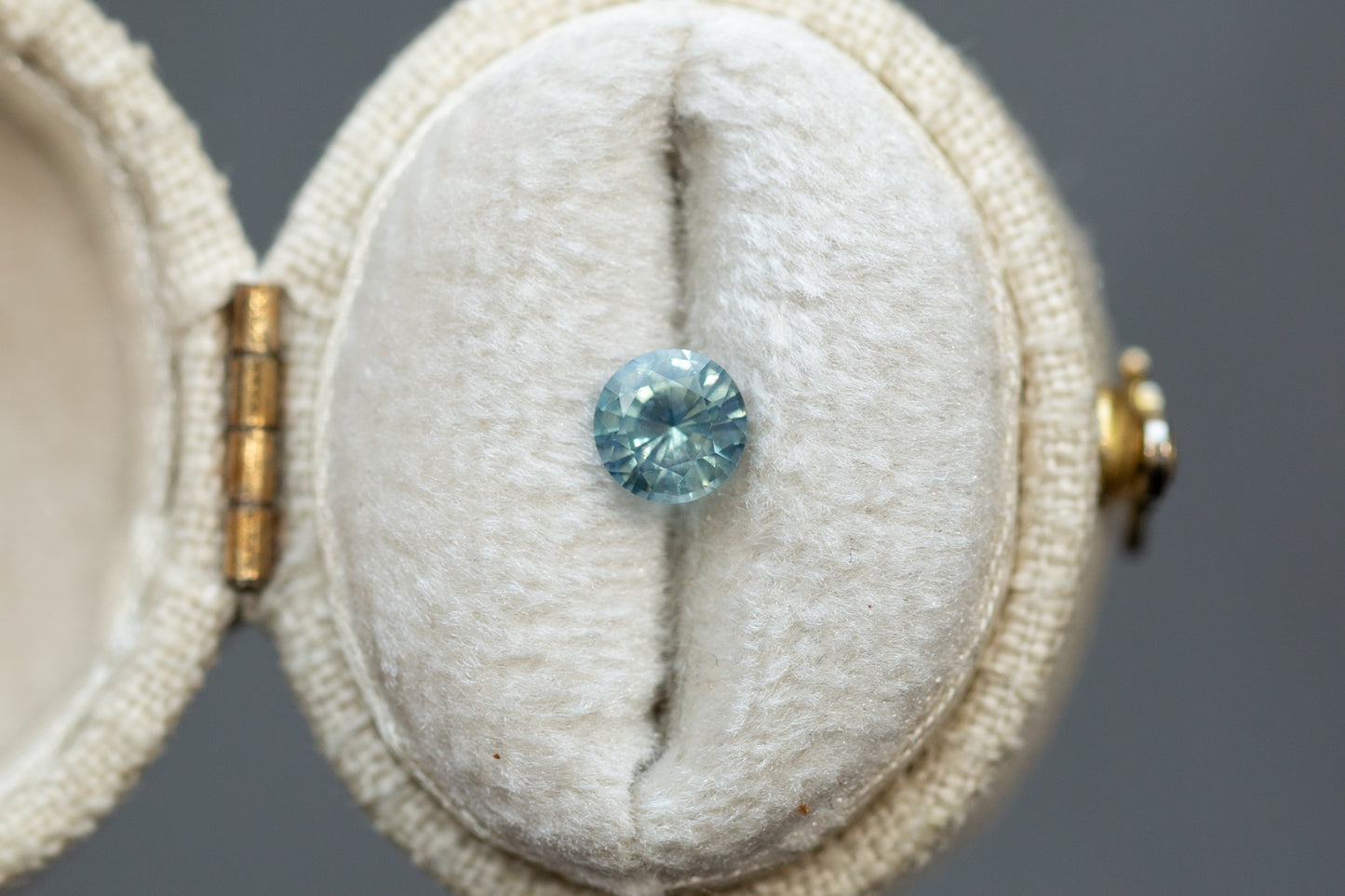 0.61ct Round Aqua Green Sapphire