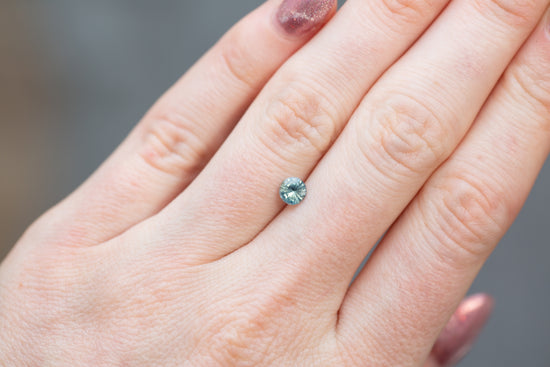 0.61ct Round Aqua Green Sapphire