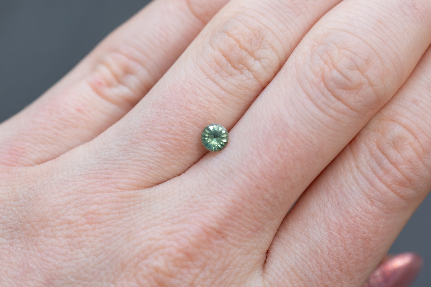 0.57ct Round Green Teal Sapphire