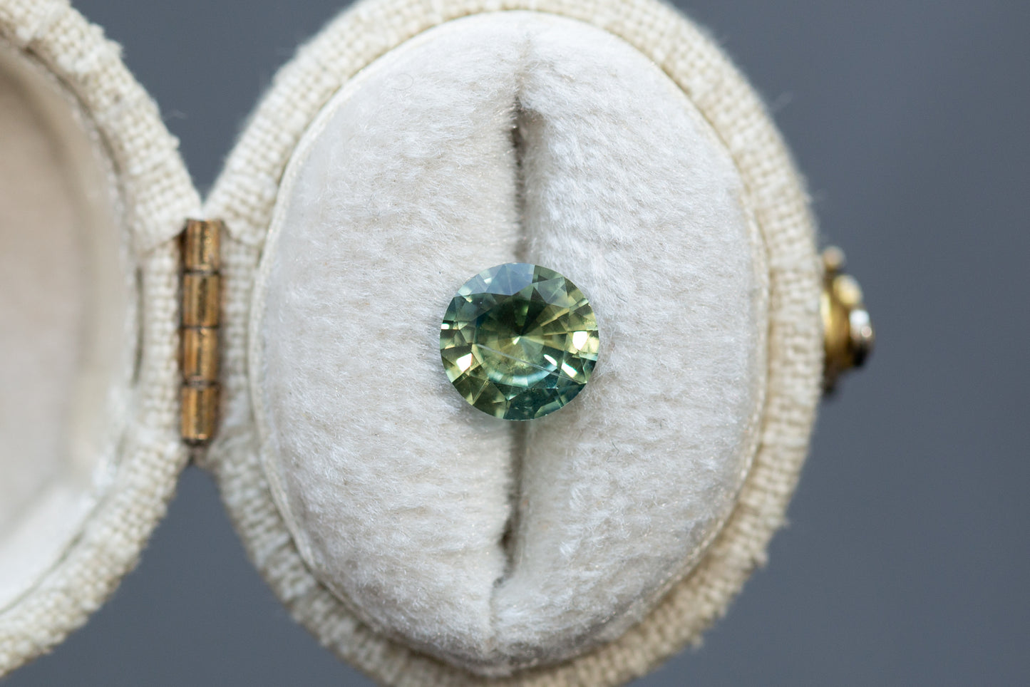 1.46ct Round Yellow Teal Sapphire