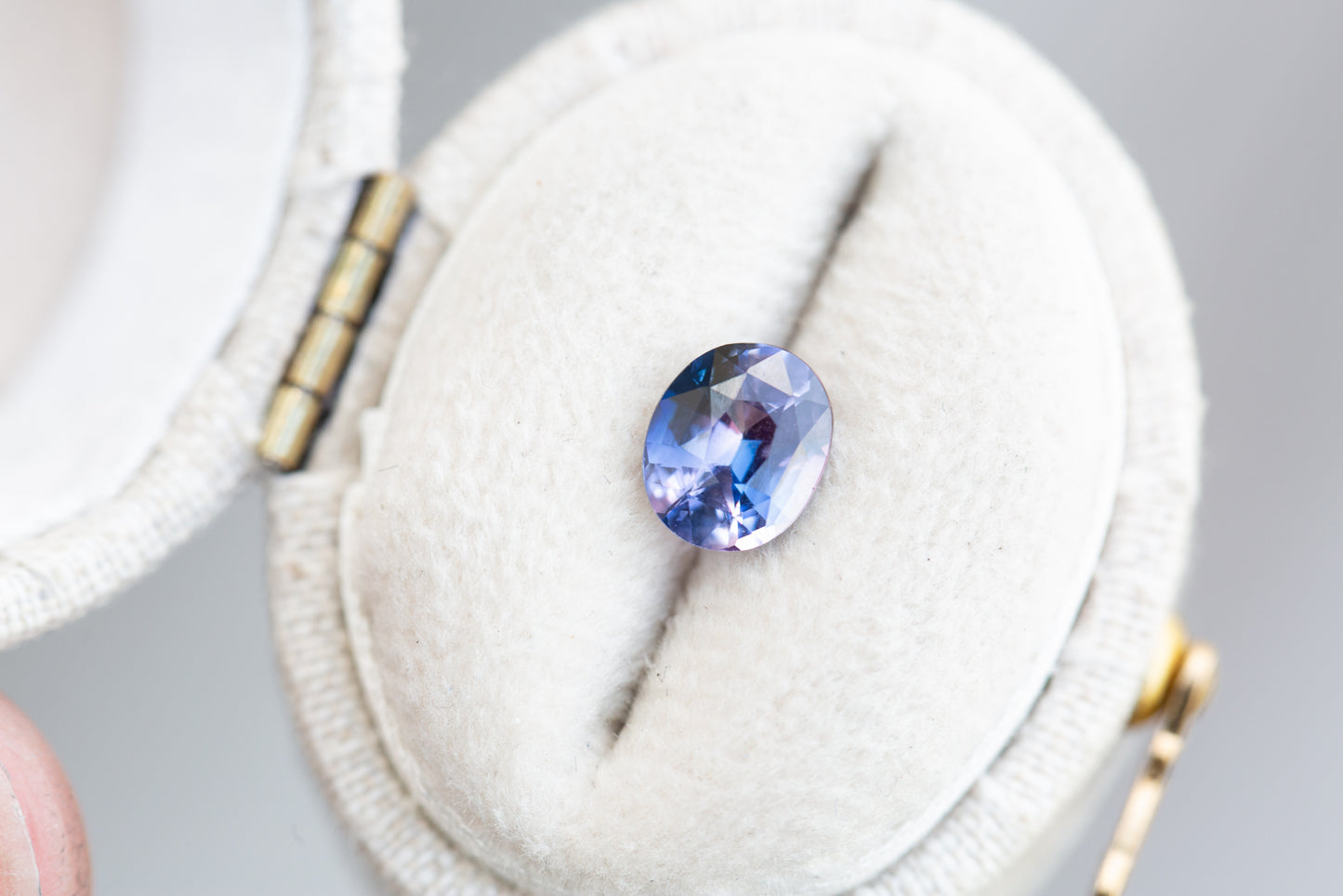 1.12ct oval bicolor purple/blue sapphire