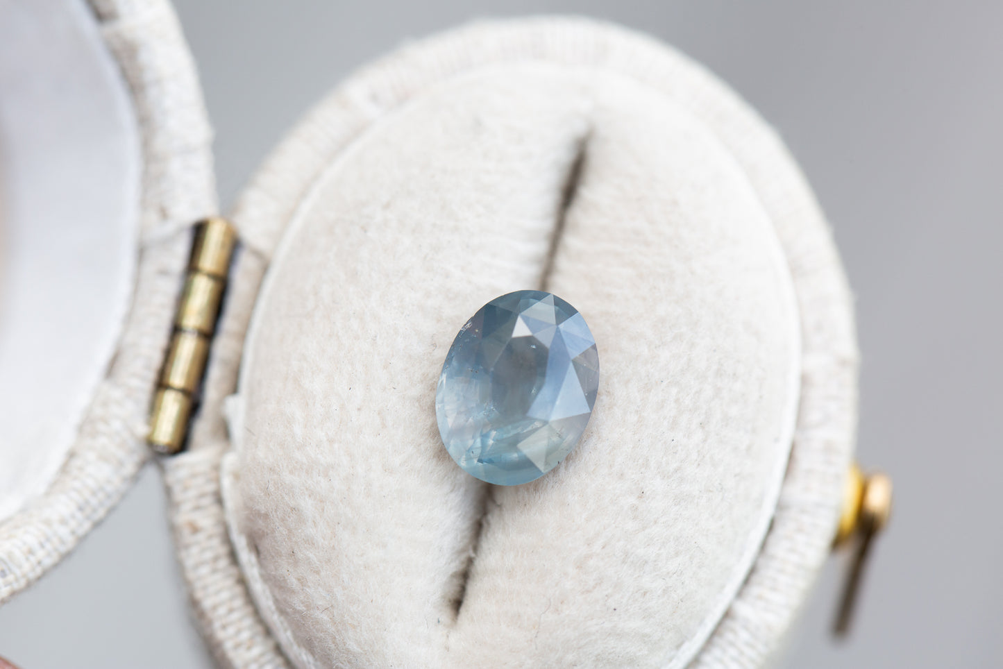 Load image into Gallery viewer, 1.93ct oval opaque blue grey sapphire
