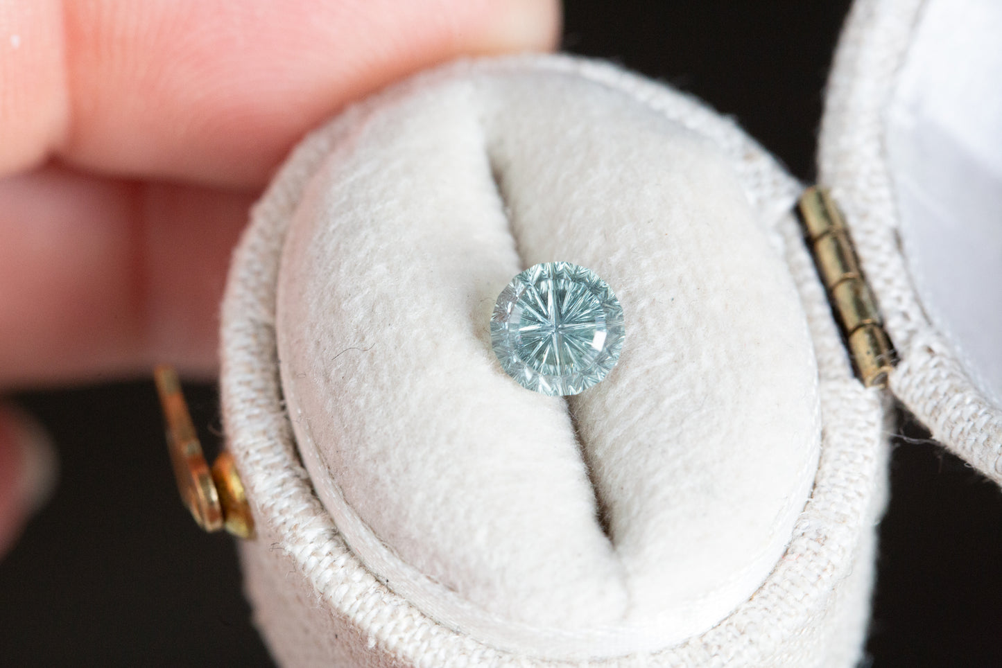 1.25ct round lighter teal sapphire - Starbrite cut by John Dyer