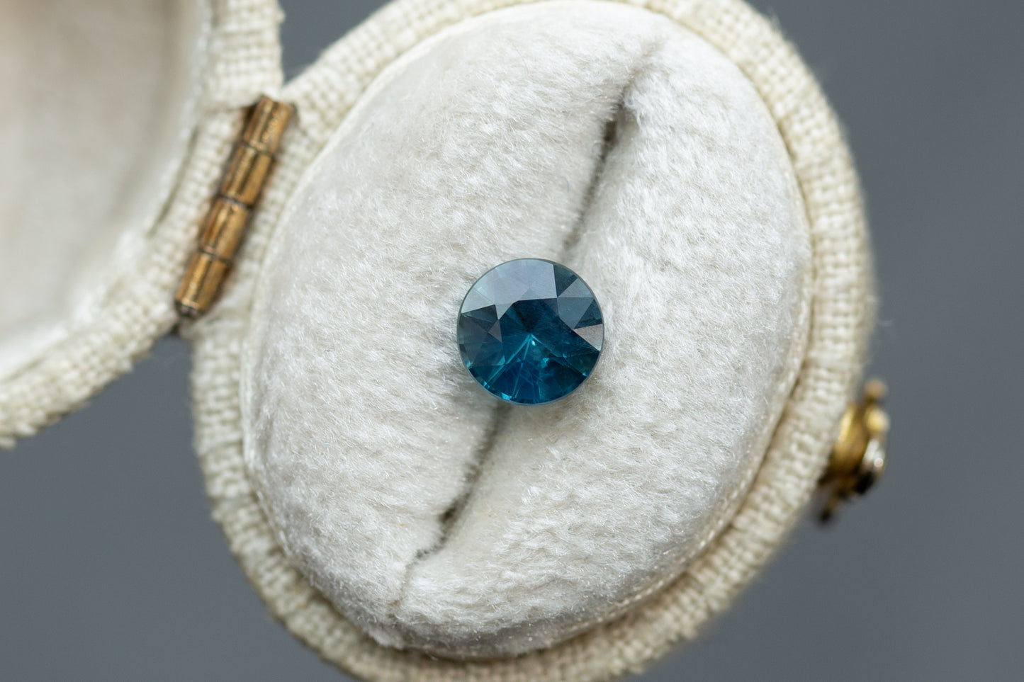 1.23ct Round Opalescent Teal Blue Sapphire