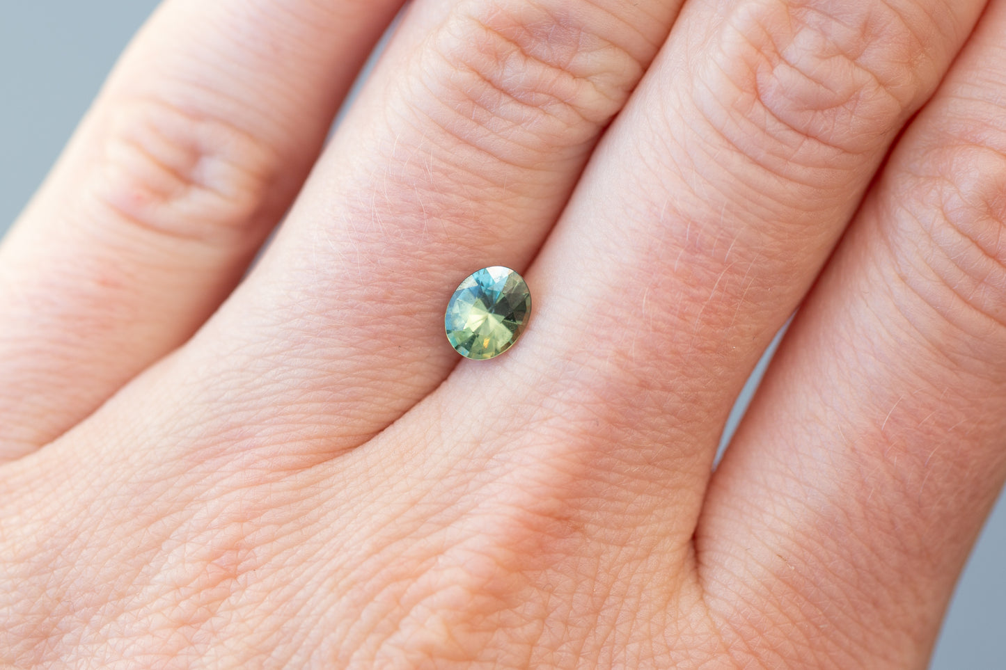 1.02ct Oval Light Green and Teal Sapphire