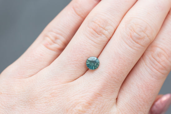 1.62ct Round Opalescent Teal Sapphire