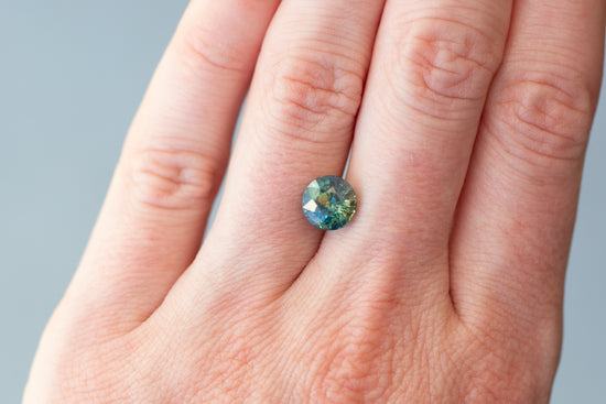 3.01ct Round Teal and Yellowish Green Sapphire