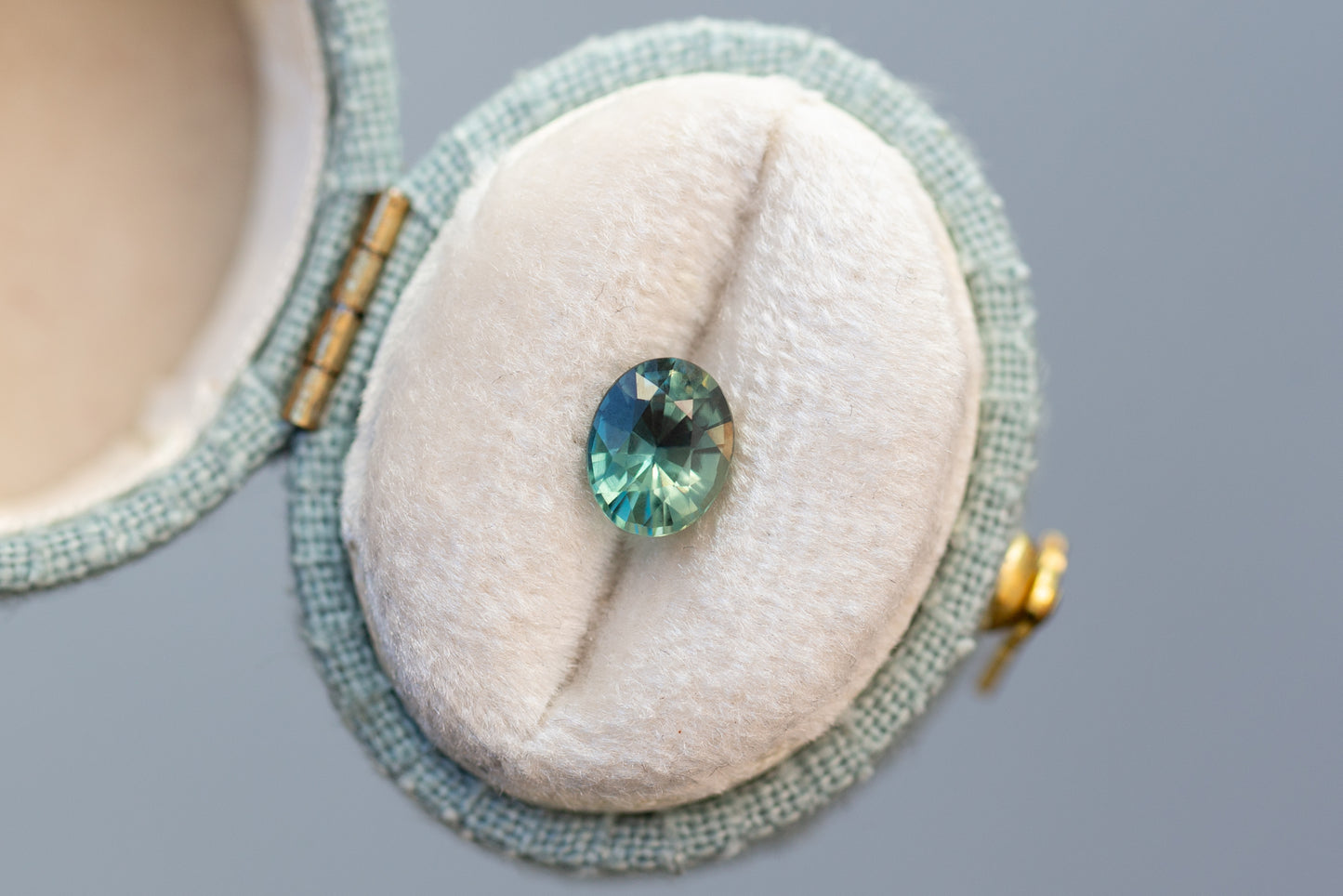 1.10ct Oval Sea Foam and Teal Sapphire