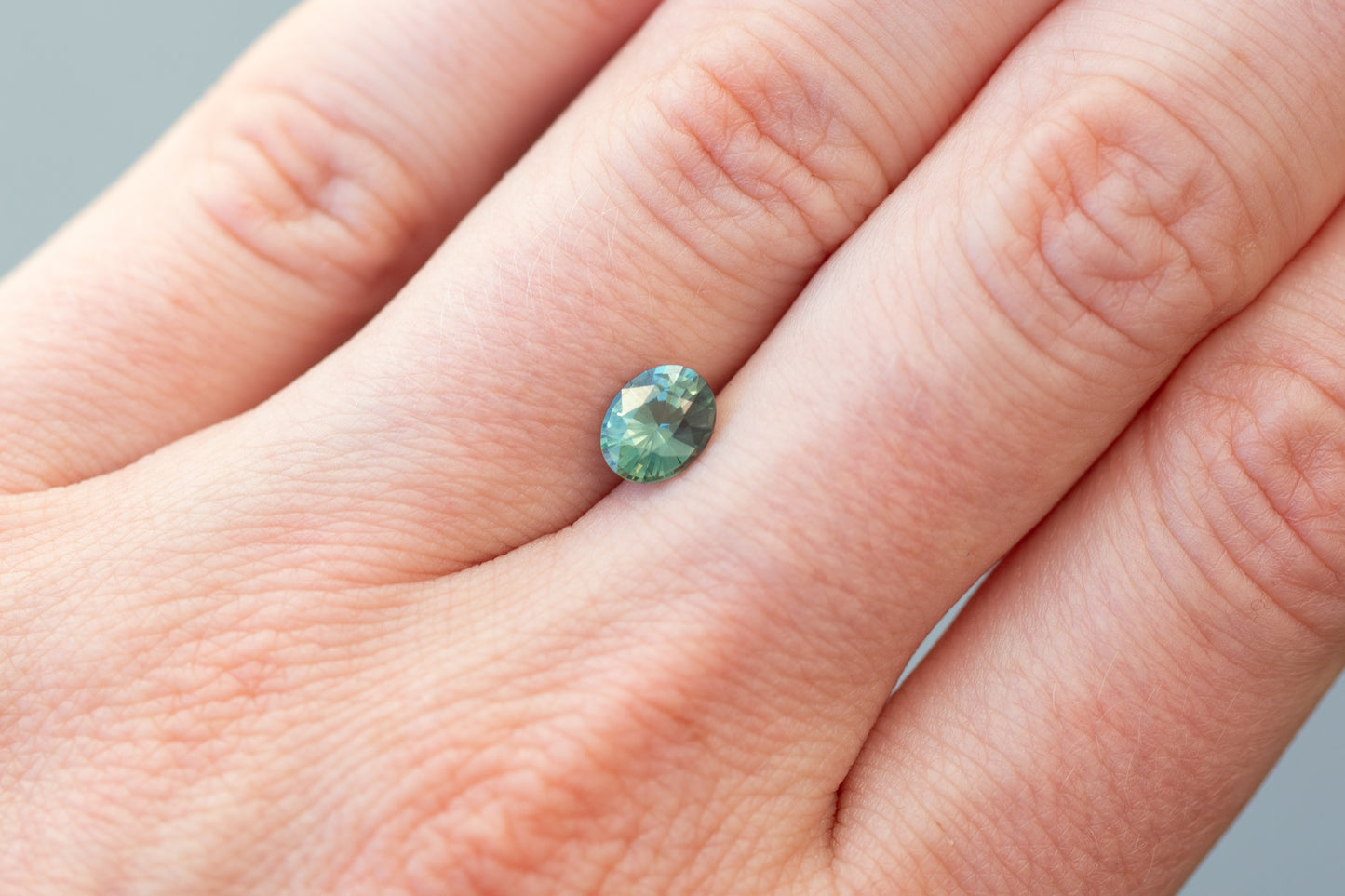 1.10ct Oval Sea Foam and Teal Sapphire