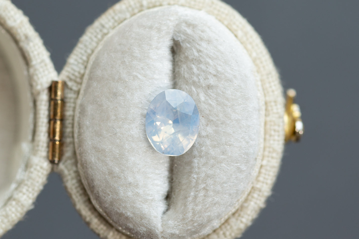 1.55ct Oval Opalescent Icy White Sapphire