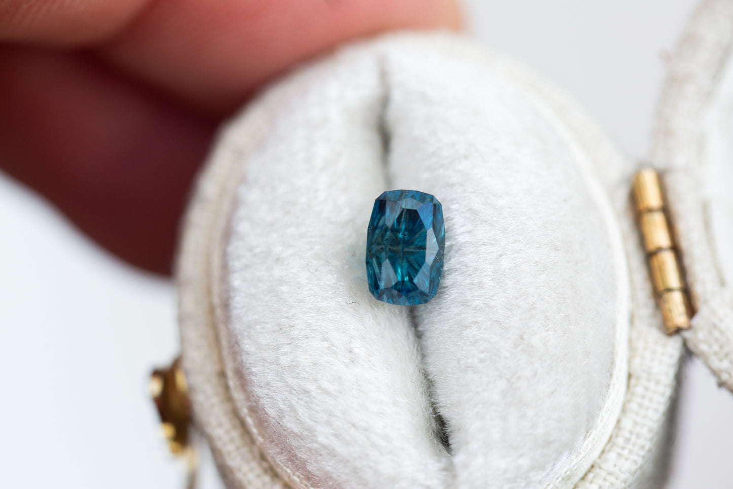 1.2ct teal blue cushion cut sapphire- Starbrite cut by John Dyer