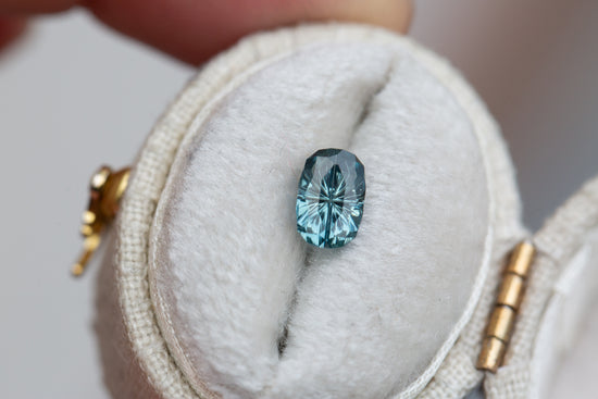 1.16ct oval teal sapphire- Starbrite cut by John Dyer