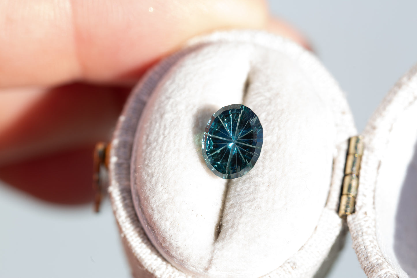 2.15ct oval deep teal sapphire - Starbrite cut by John Dyer