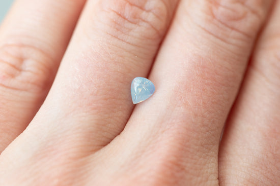 0.65ct Pear Opalescent Light Blue Sapphire